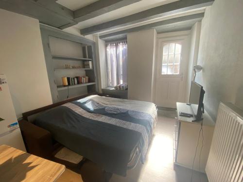 Postel nebo postele na pokoji v ubytování Chez Nono - Studio chaleureux proche thermes