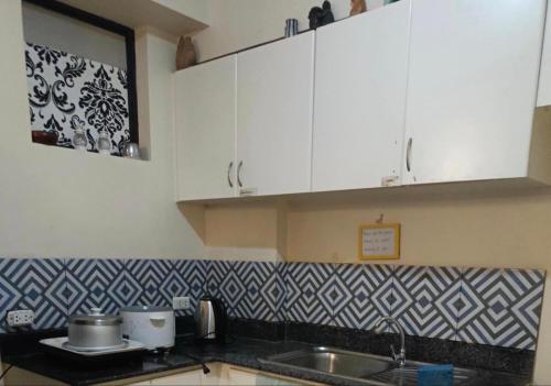 Kuchyň nebo kuchyňský kout v ubytování Davao Condo Chateau Soleil