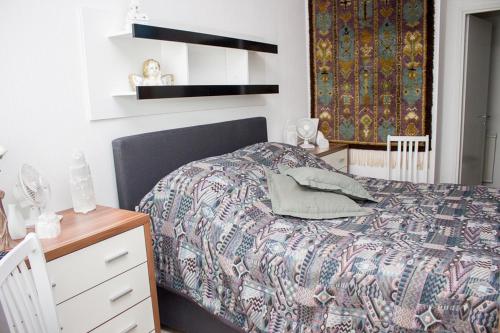 Postel nebo postele na pokoji v ubytování Laivalinnankatu