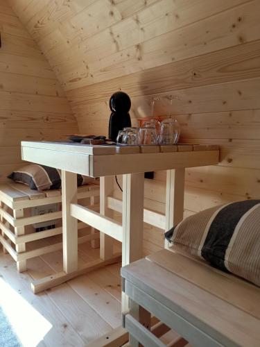 a wooden room with a table in a cabin at B&B Cascina Sant'Elena in Bubbio
