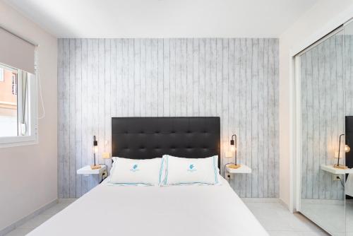 Letto o letti in una camera di El Médano By Agüita Salada Suites