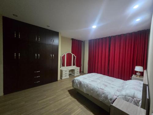 Llit o llits en una habitació de Quirpinchaca Premier