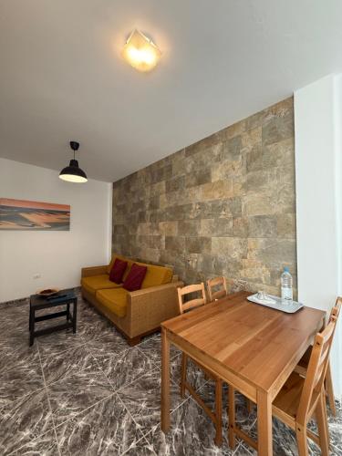 Posezení v ubytování Apartamentos La Aldea Suites
