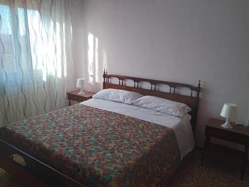 Postel nebo postele na pokoji v ubytování Affittacamere di Ilir