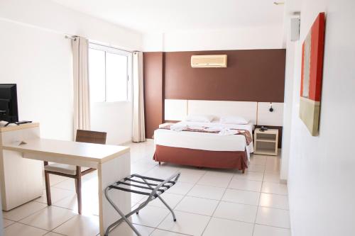 Katil atau katil-katil dalam bilik di Apartamento Le Jardin