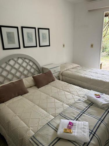 Una cama o camas en una habitación de Dona Hotel