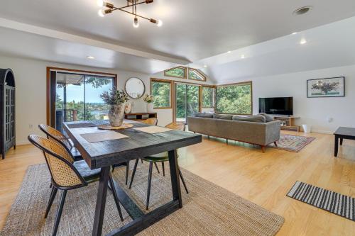 a living room with a table and chairs and a couch at half Mi to Yarrow Bay Family Home in Kirkland in Kirkland