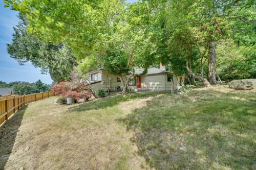 a house with a fence and a yard at half Mi to Yarrow Bay Family Home in Kirkland in Kirkland
