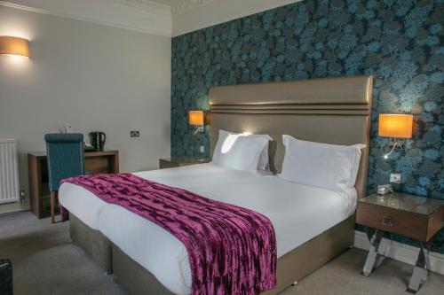 Ένα ή περισσότερα κρεβάτια σε δωμάτιο στο Crabwall Manor & Spa - BW Signature Collection