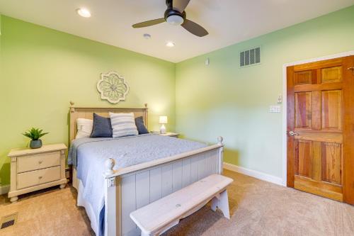 a bedroom with a bed and a ceiling fan at 1 Block to Inlet Beach Brigantine Family Home in Brigantine