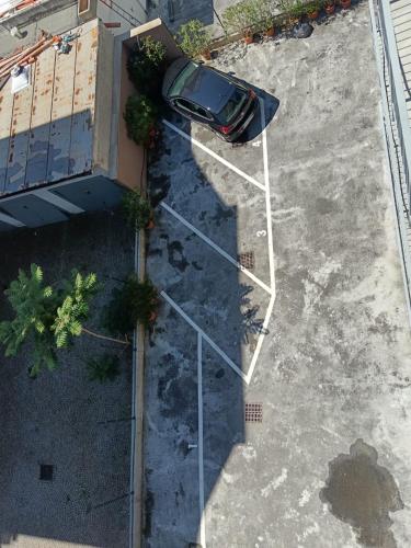 an overhead view of a car parked on a street at Apartaments and Rooms Claudia Augusta in Bolzano