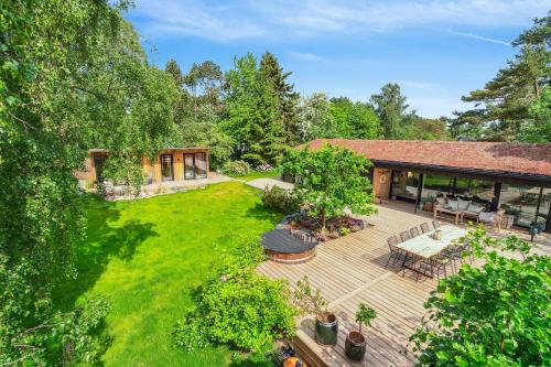 an overhead view of a backyard with a patio at Relaxed Lifestyle And Luxury In Melby in Melby