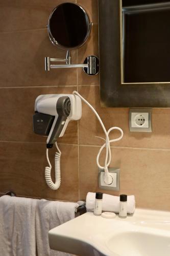 Ένα μπάνιο στο Apartahotel Punta Calera