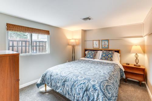 a bedroom with a bed and a window at Dock and Backyard Bar Spacious Barnegat Bay Retreat in Waretown