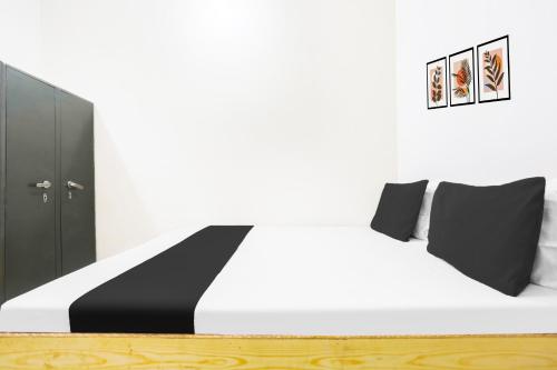 Postel nebo postele na pokoji v ubytování Hotel O CityMax