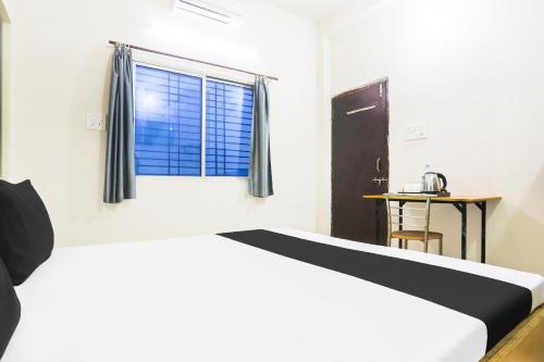 Postel nebo postele na pokoji v ubytování Hotel O CityMax