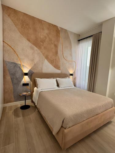 Postel nebo postele na pokoji v ubytování The Fratta Lodge - Boutique Stay