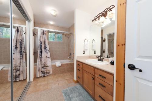 a bathroom with a sink and a shower at 672 Beaver Circle in Durango Mountain Resort