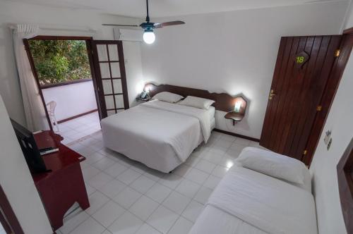 Katil atau katil-katil dalam bilik di Arambare Buzios Hotel