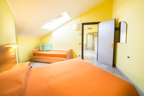 Katil atau katil-katil dalam bilik di Diano Sporting Apartments