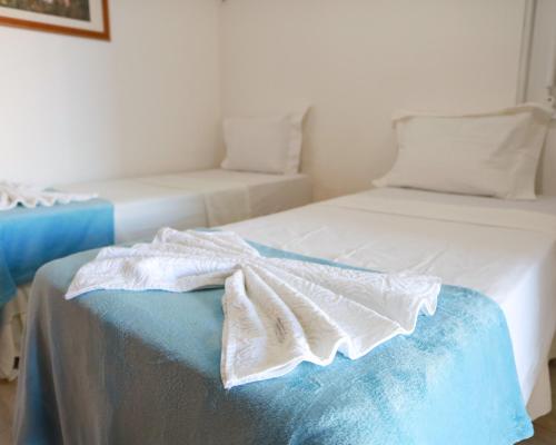 Postel nebo postele na pokoji v ubytování Las Olas Village Pousada