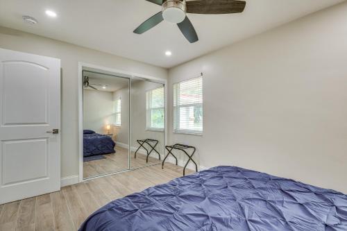 a bedroom with a bed and a ceiling fan at Backyard Oasis Fort Lauderdale Home Near Beach in Fort Lauderdale