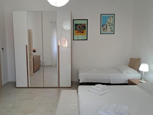 Katil atau katil-katil dalam bilik di The Green House Suite & Apartment