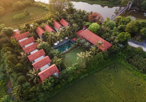 an aerial view of a house with a swimming pool at Coco Island Resort Ninh Binh in Ninh Binh