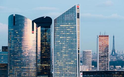 a group of tall buildings in a city at chambre avec salle de bain privée au cœur de La Défense in Nanterre
