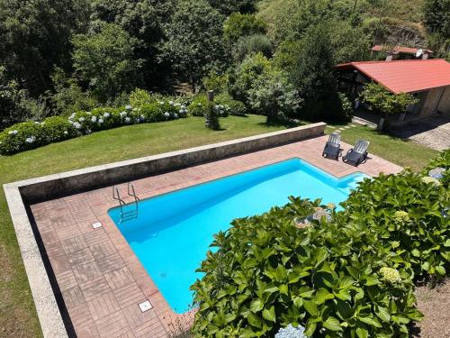 Der Swimmingpool an oder in der Nähe von Casa da Forja - Gerês