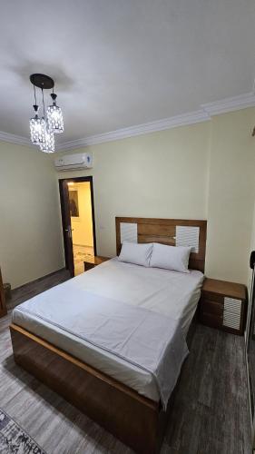 a bedroom with a large bed in a room at The Nest - Tiran View in Sharm El Sheikh