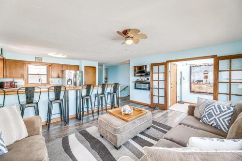 a living room with a couch and a table at Walk to Beach Dog-Friendly Home in Lincoln City in Lincoln City