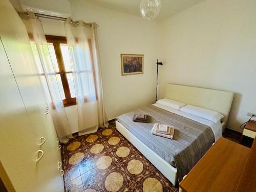 Ένα ή περισσότερα κρεβάτια σε δωμάτιο στο Villa Maria
