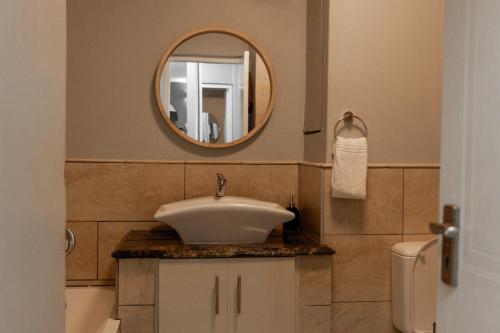 Ένα μπάνιο στο 3 bedroom Umdloti 203 Sorgente apartment