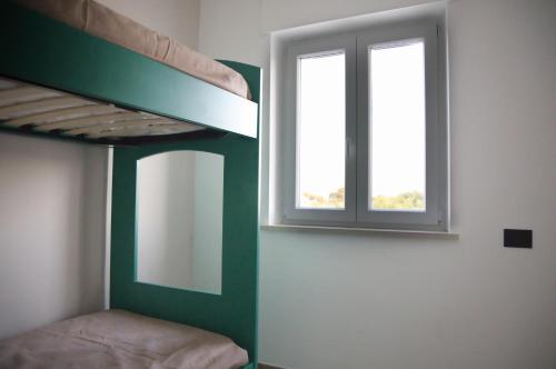 Letto o letti in una camera di Villa Celeste