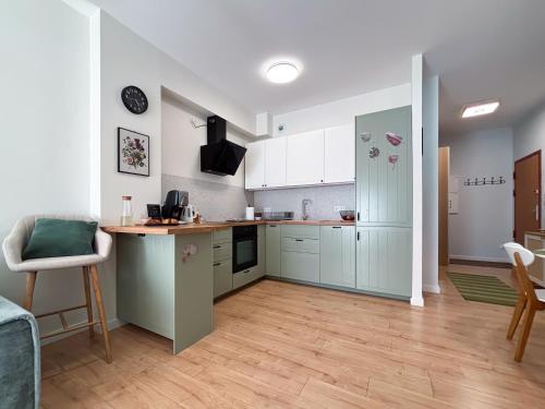 Una cocina o zona de cocina en Apartament Mona Jeżyce