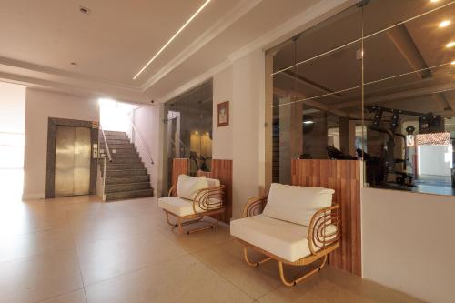 Χώρος καθιστικού στο Marujos Suíte Hotel