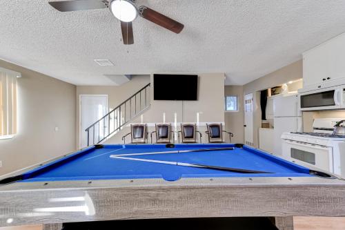 a large blue pool table in a kitchen at Strip-side Villa, 6 Beds, Pool, Mini Golf, Karaoke in Las Vegas