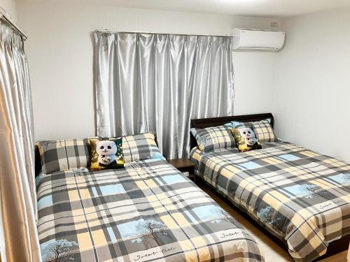 Postel nebo postele na pokoji v ubytování Uenoyuyunoie - Vacation STAY 19367