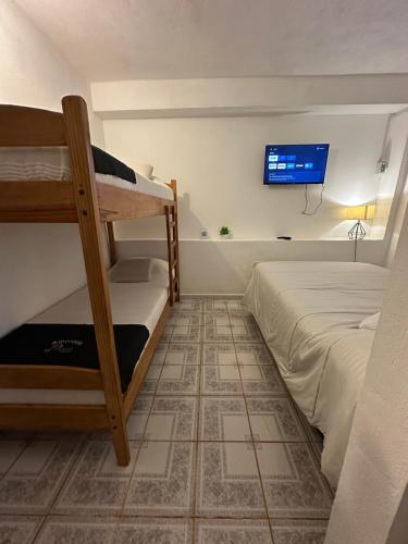 Postel nebo postele na pokoji v ubytování Posada Turistica Alborada