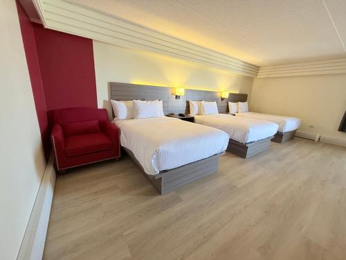 Postel nebo postele na pokoji v ubytování Westport Inn