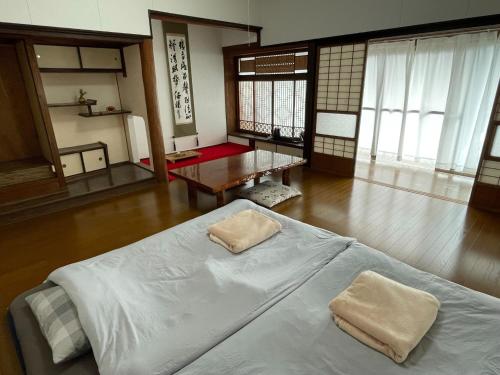 Кровать или кровати в номере Kaen - Vacation STAY 19038