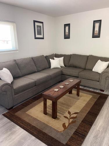 a living room with a couch and a coffee table at Mi Casa Su Casa in Lemon Grove