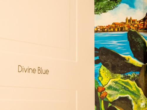 a painting of a whale in the water at Cefalù Luxury Suite in Cefalù