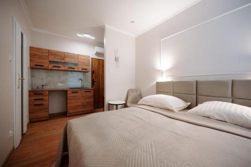 Katil atau katil-katil dalam bilik di Diamond Boutique Hotel