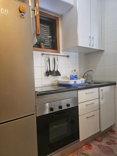 Η κουζίνα ή μικρή κουζίνα στο Residencial Sol Suite 2