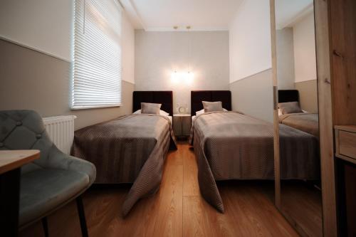 Katil atau katil-katil dalam bilik di Diamond Boutique Hotel