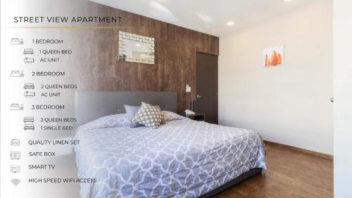 a bedroom with a bed and a wall with descriptions at 401 Location 3Bdrm 2bath apt with AC Rooftop in Mexico City