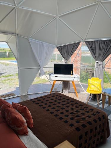 Ένα ή περισσότερα κρεβάτια σε δωμάτιο στο Tihi glamping club