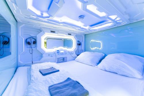 a bedroom with two beds in an rv at Space Home Apartment - Prater in Vienna